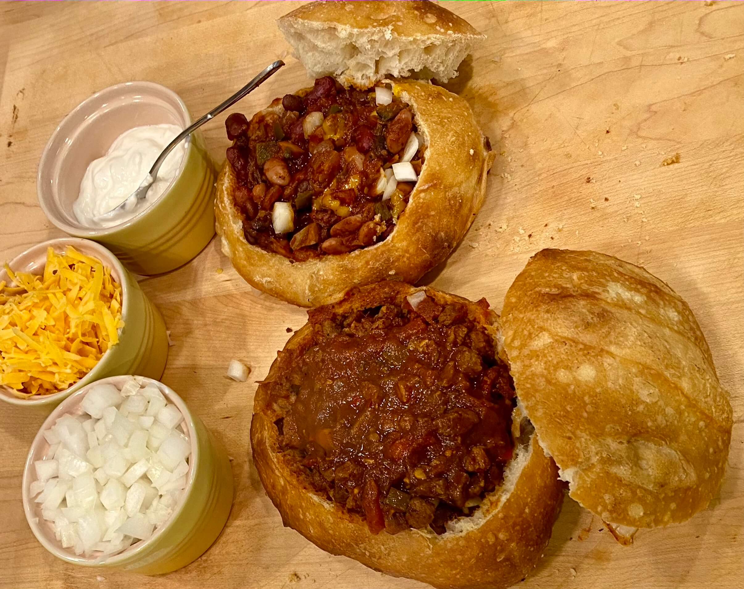 chili in bread bowls with sides
